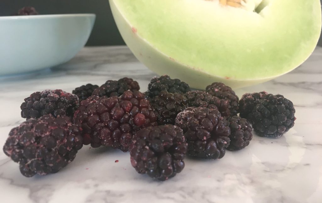 A recipe of refreshing spring and summer salad made with honeydew melon and blackberries